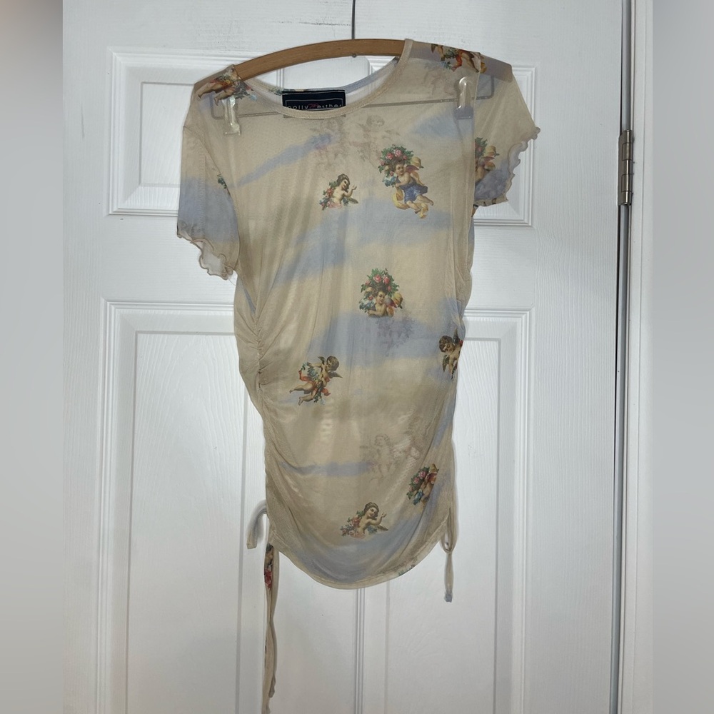 Polly & Esther Sheer ruched
Sleeves Top with Cherub print - Large